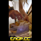 Miss Marilyn, in yellow panties, squats over a clear container and then shows the poop in it. Presented in 720P vertical HD format. About a minute.